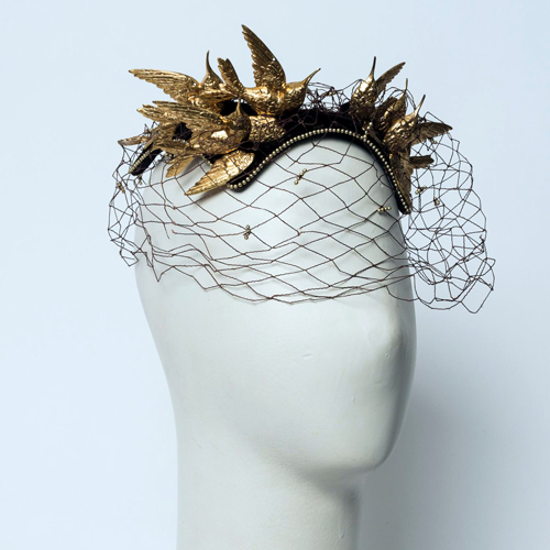 Velvet hatlet with gold birds on the top and face netting